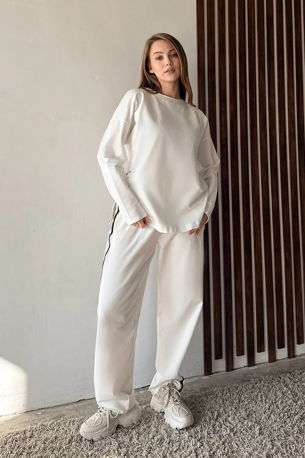 Milk suit with contrasting stripes