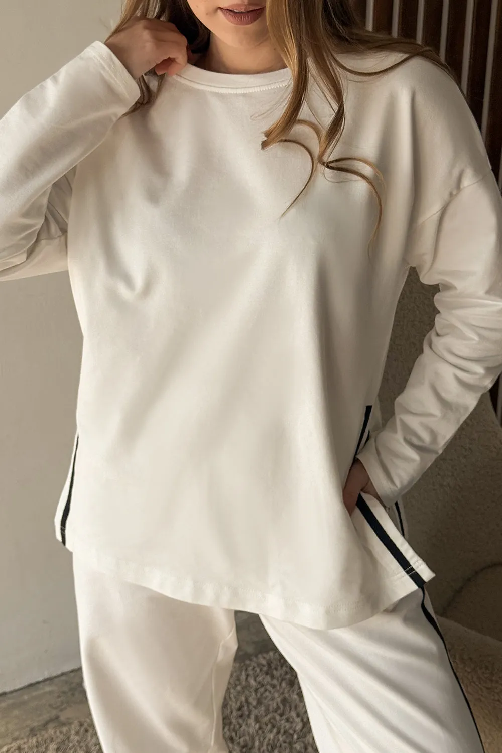 Milk suit with contrasting stripes