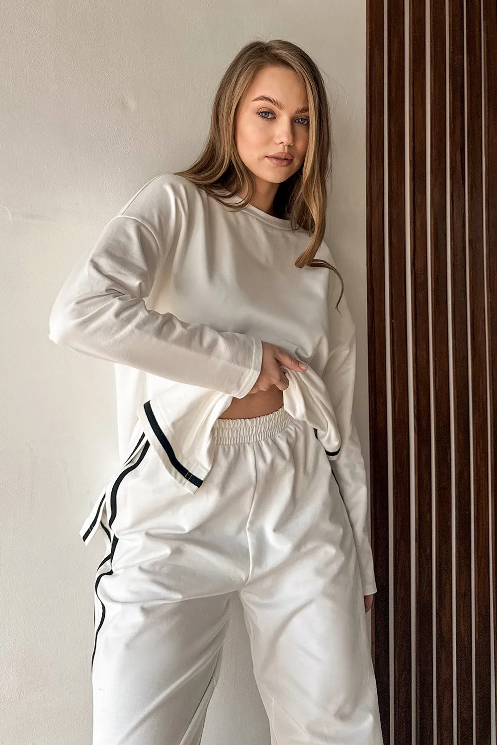 Milk suit with contrasting stripes
