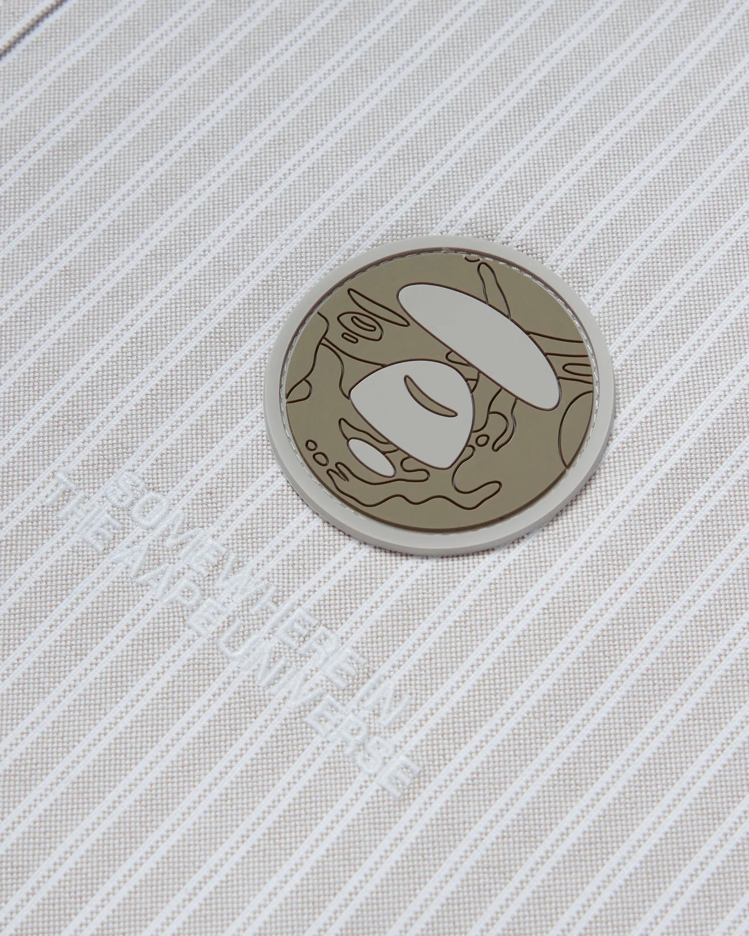 Moonface patch striped shirt
