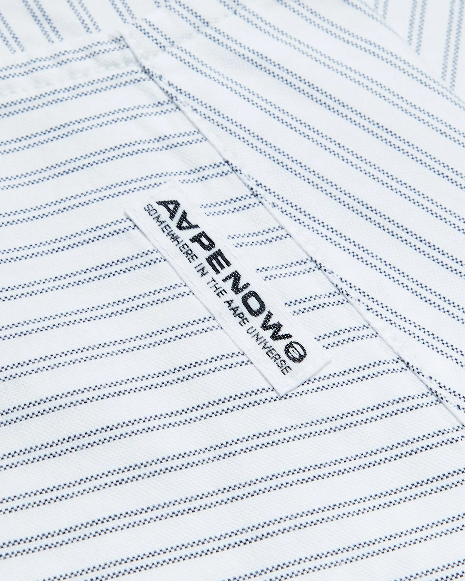 Moonface patch striped shirt