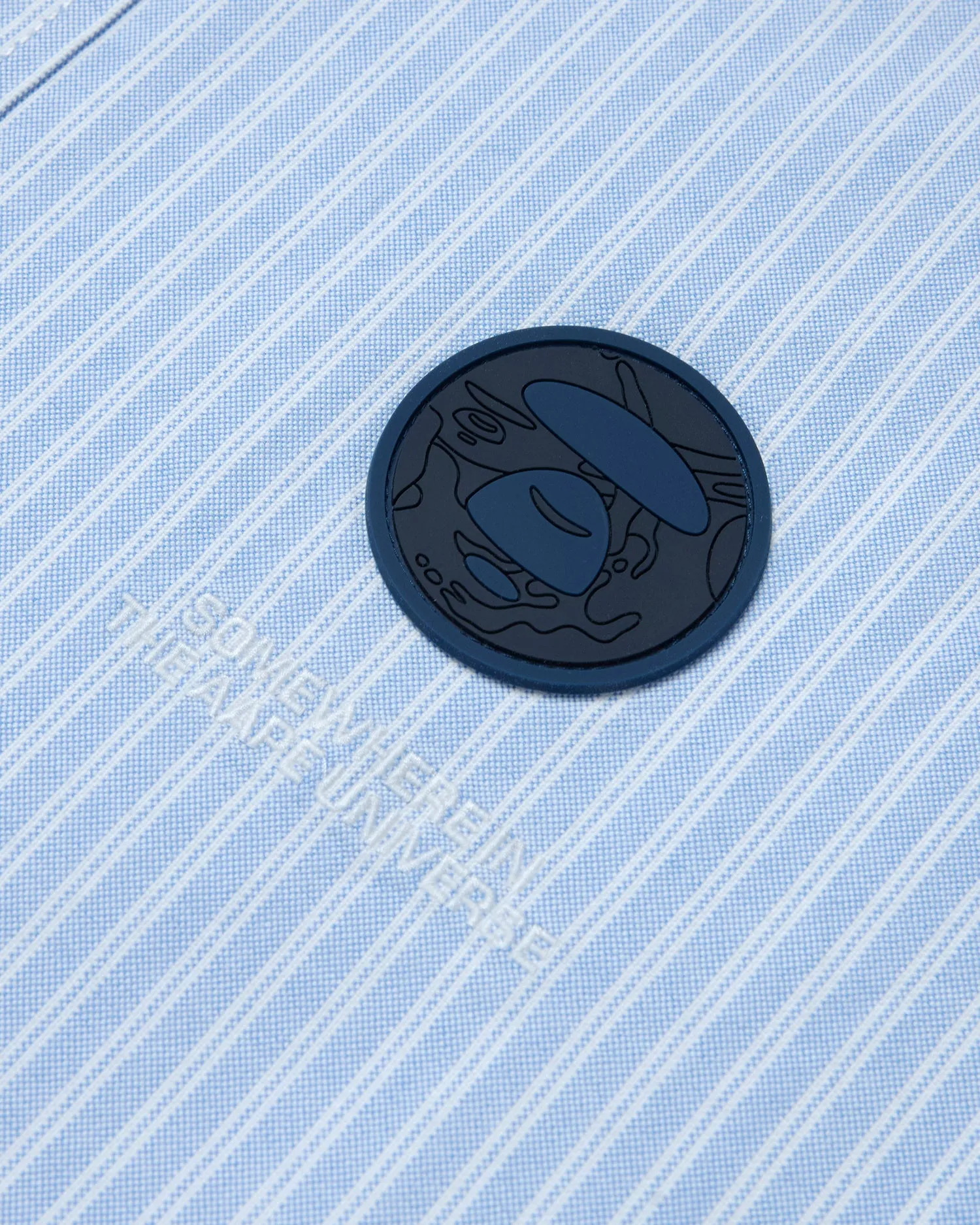 Moonface patch striped shirt