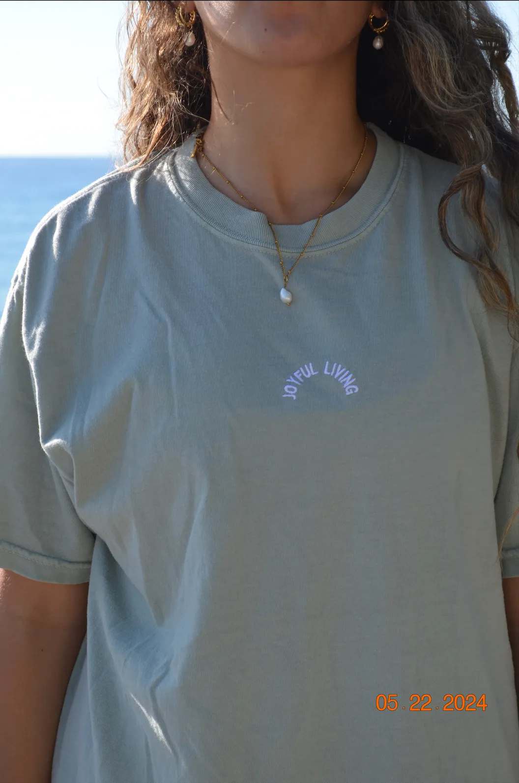 "mightier than the waves" t- shirt